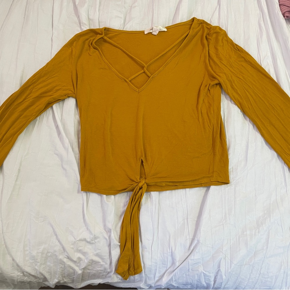yellow long sleeve shirt